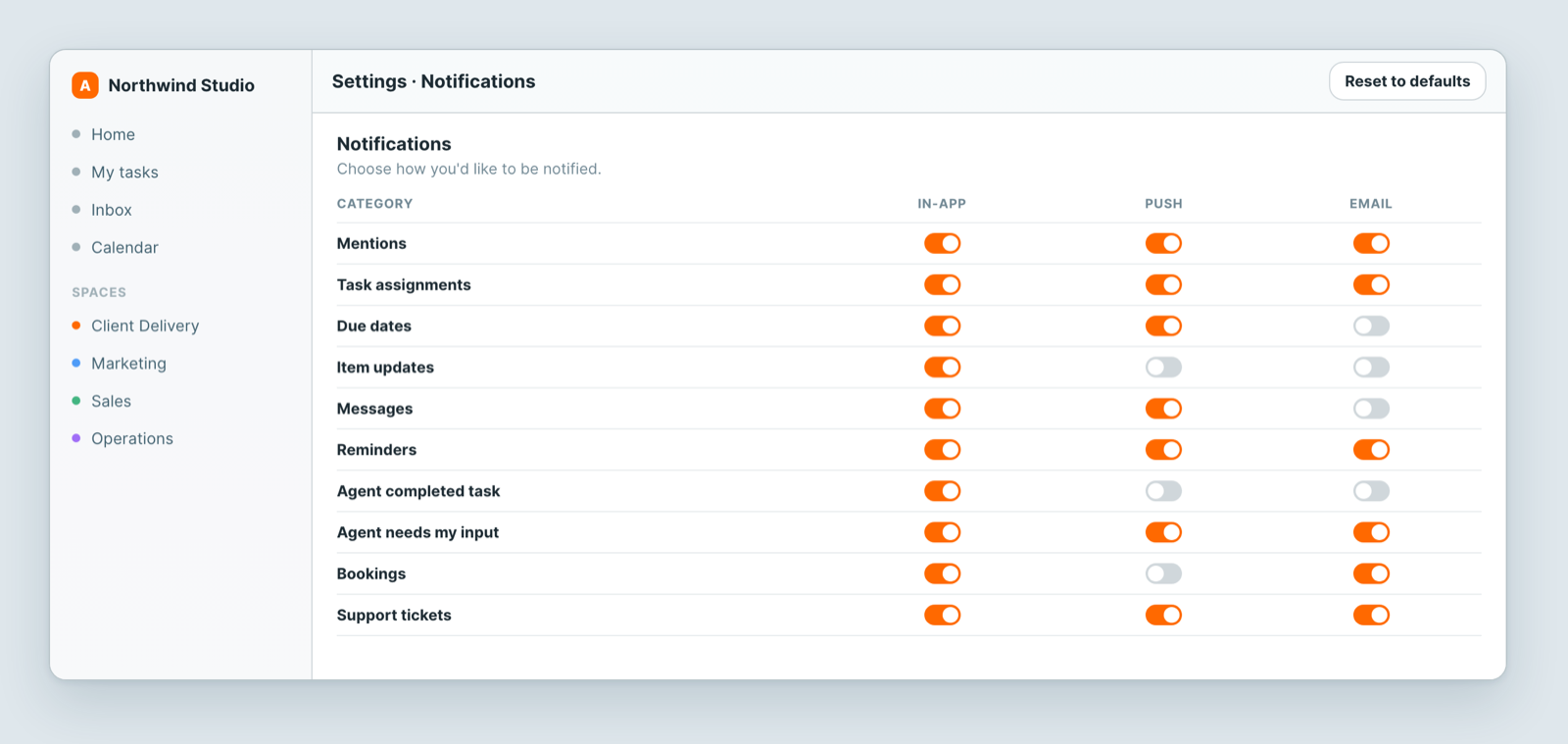 Notification settings, with in-app, push and email switches per category