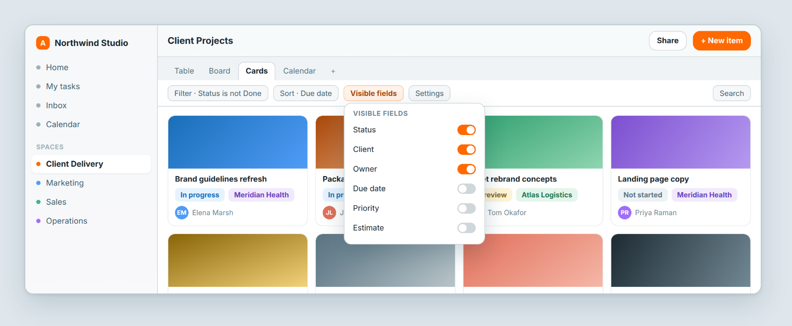 Card view with cover images, and the Visible fields list open to choose what each card shows